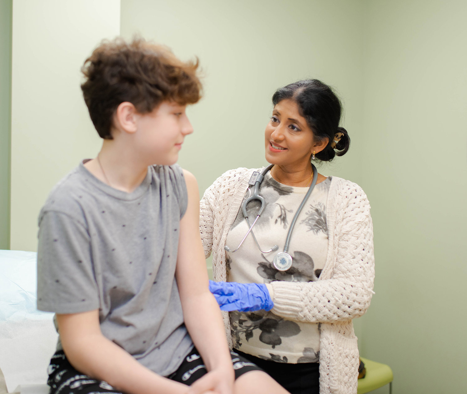 The Wright Center for Community Health provides primary and preventive care services for patients of all ages, income levels, and insurance statuses at its network of health care clinics in Northeast Pennsylvania. Dr. Manju Mary Thomas, a pediatrician, provides a well-visit checkup for a pediatric patient at the Mid Valley Practice in Jermyn, PA.